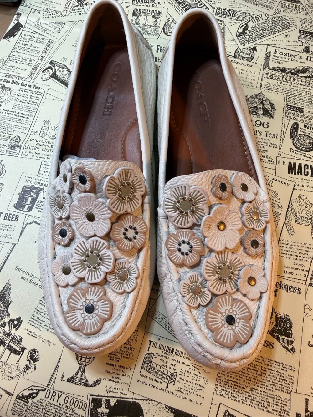 Brand New!  Coach tea rose moccasins in size 9.5!